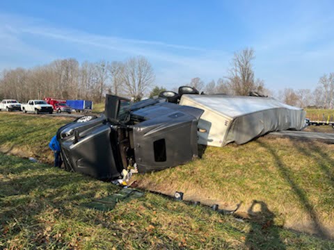 Overturned semi tractor trailer blocks traffic on Parkway early Friday ...